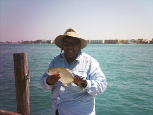 Lolita with her Pompano dinner